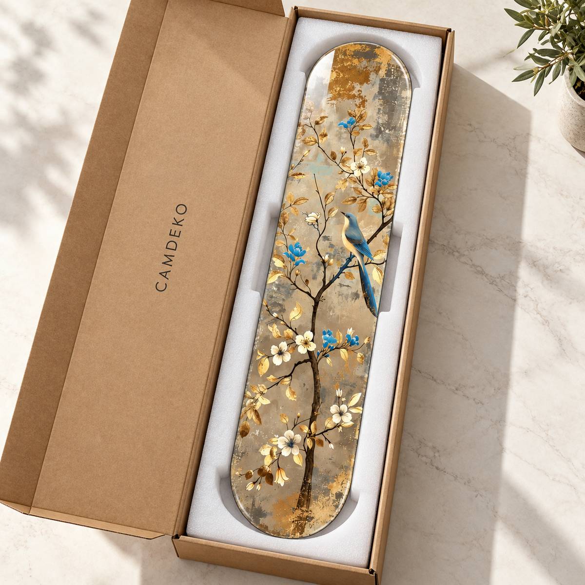 Altın Yapraklar Arasında Mavi Kuş Dikey Skate Board Cam Tablo – CAMDEKO ambalajı