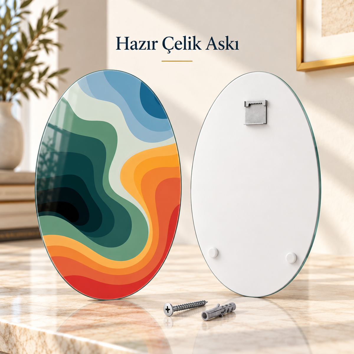 Oval dikey cam tablo ön ve arka yüz; üst ortada tek CAMDEKO çelik askı ve altta iki beyaz tampon